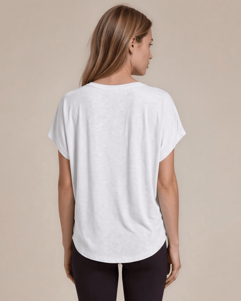 Women's viscose bamboo & organic cotton poncho tee in white. Super soft, breathable, cooling, dolman fit. Sustainably made in USA. Sizes XS–XL.