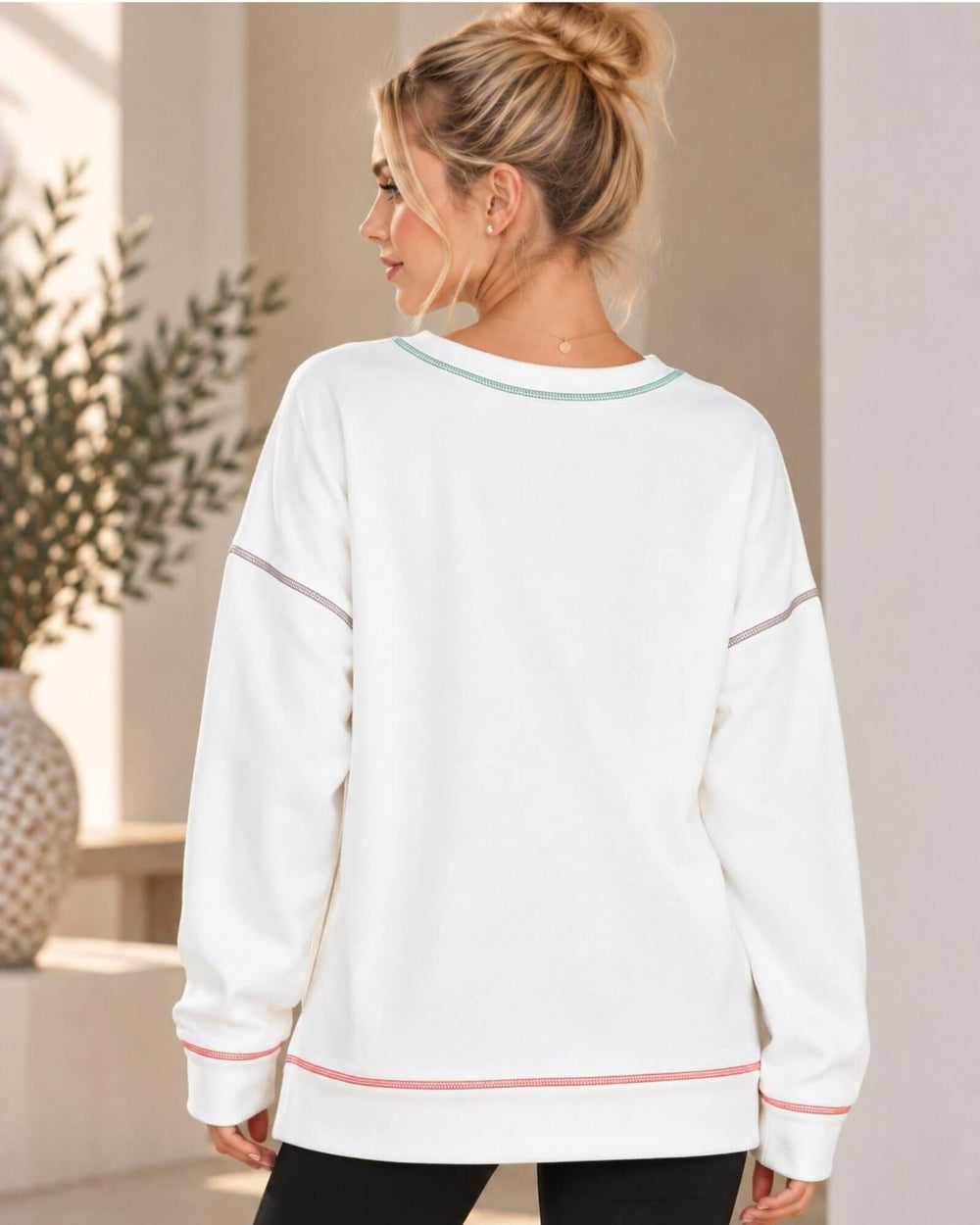 Made in USA white oversized crewneck sweatshirt with colorful contrast stitching and long sleeves