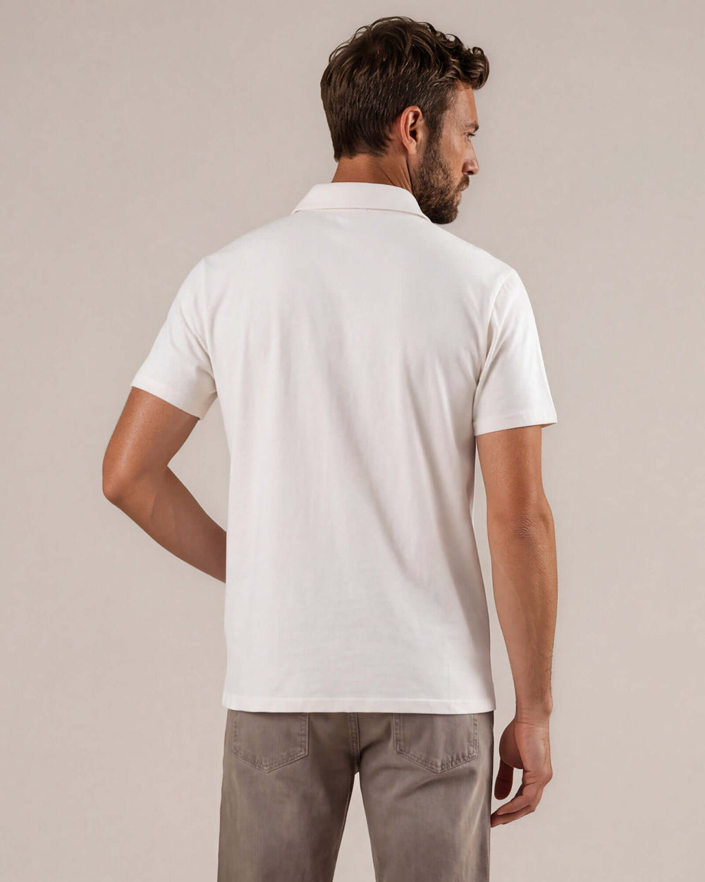 Made in USA men's natural short sleeve cotton polo shirt with 3-button placket, back view