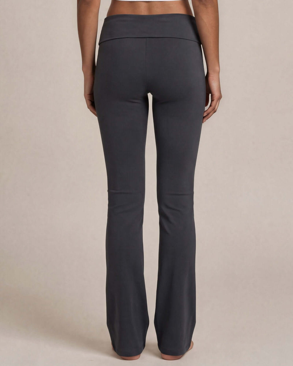 Made in USA women's asphalt cotton spandex yoga pant with wide waistband and slight flare leg, back view