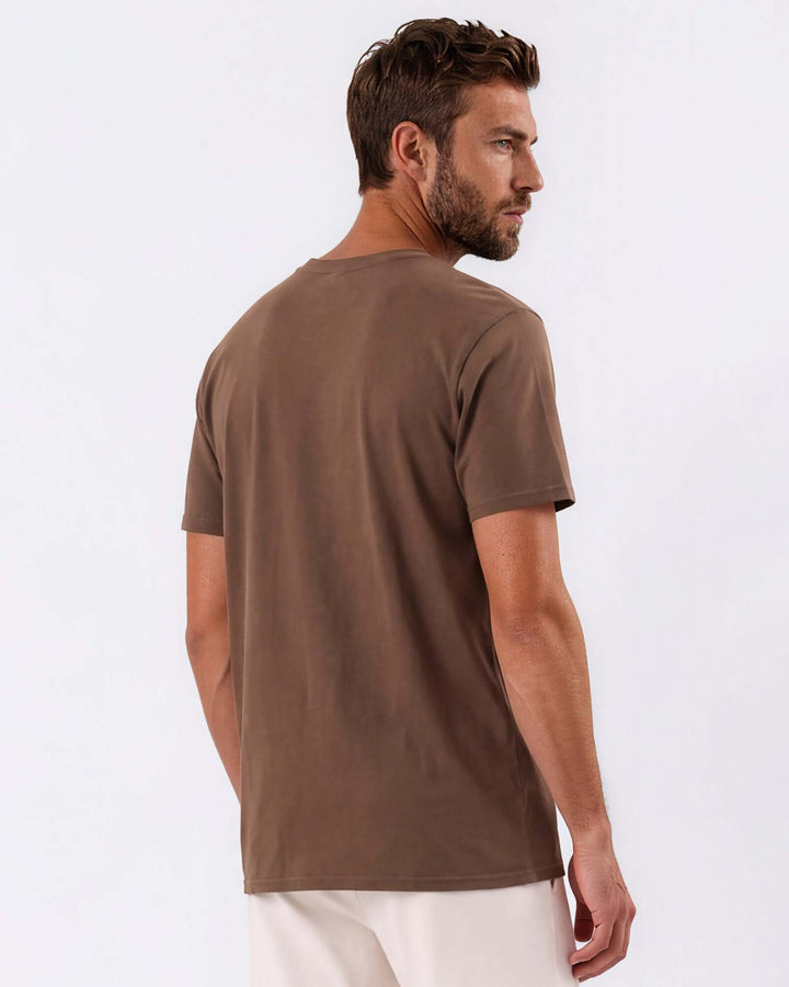 Made in USA Vintage Pigment Dyed Softest Tee - Java: back view of brown short sleeve tee on male model, looking over shoulder