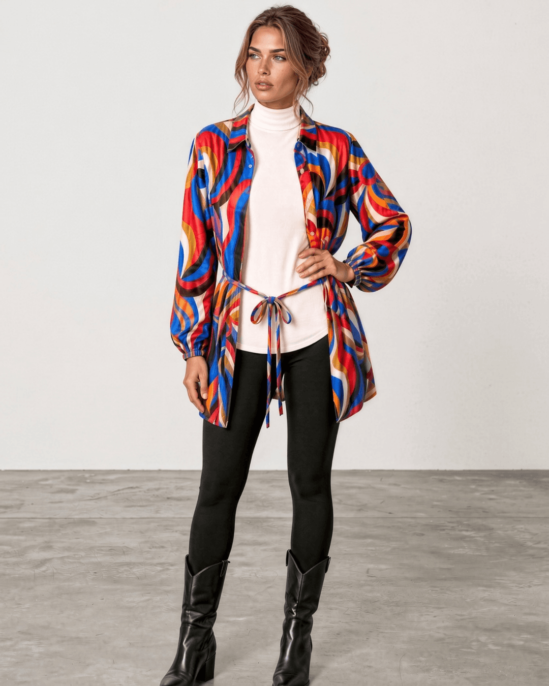 Made in USA. Style the Alexis Retro Print button-down tunic closed with its tie waist or open as a cardigan. Colorful abstract print, fully lined. S–L.