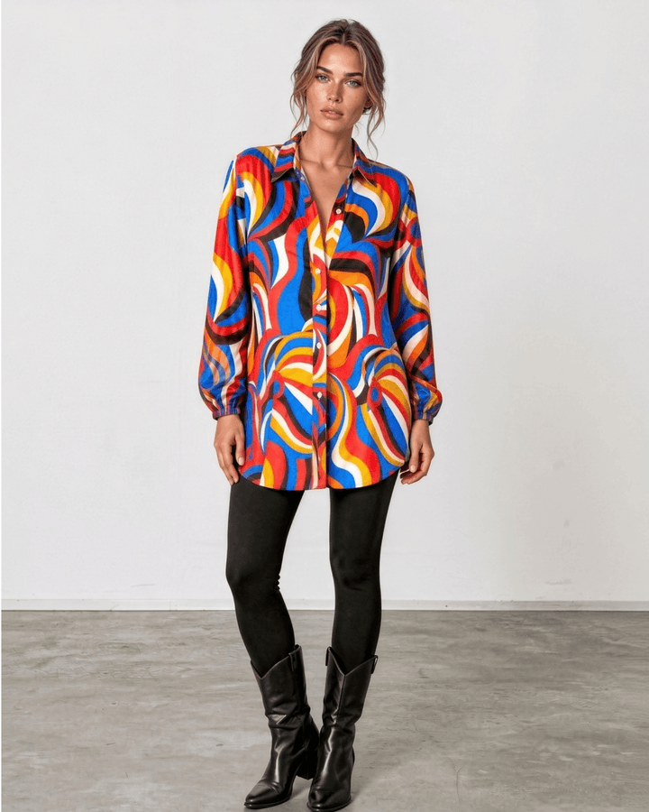 Made in USA. Style the Alexis Retro Print button-down tunic closed with its tie waist or open as a cardigan. Colorful abstract print, fully lined. S–L.