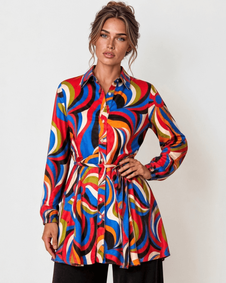 Made in USA. Style the Alexis Retro Print button-down tunic closed with its tie waist or open as a cardigan. Colorful abstract print, fully lined. S–L.