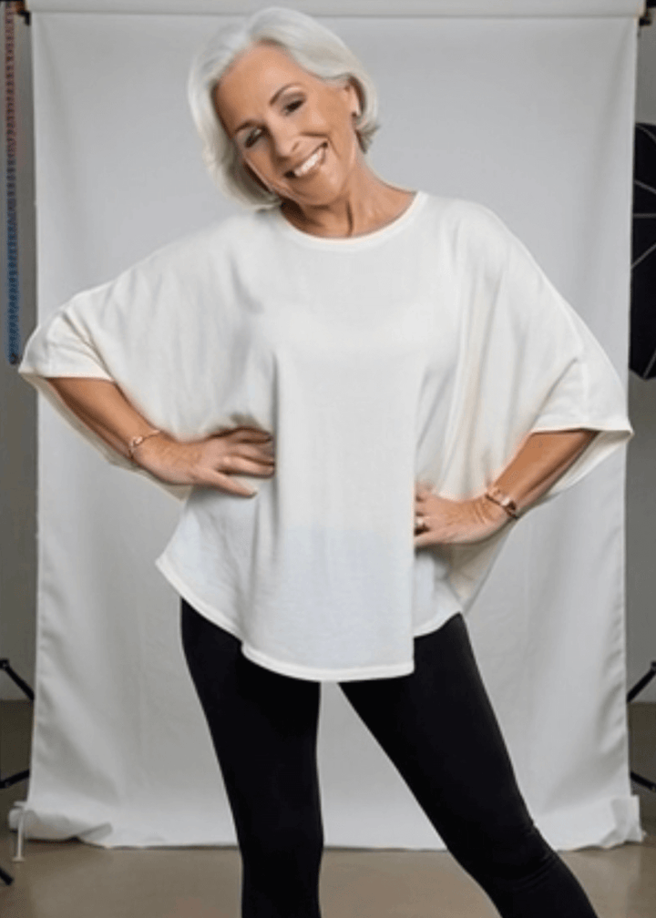 Slip into effortless style with this made in USA oversized dolman sleeve cotton top, designed for maximum comfort without compromise. The soft, lightweight 95% cotton blend with 5% spandex drapes beautifully while moving with you