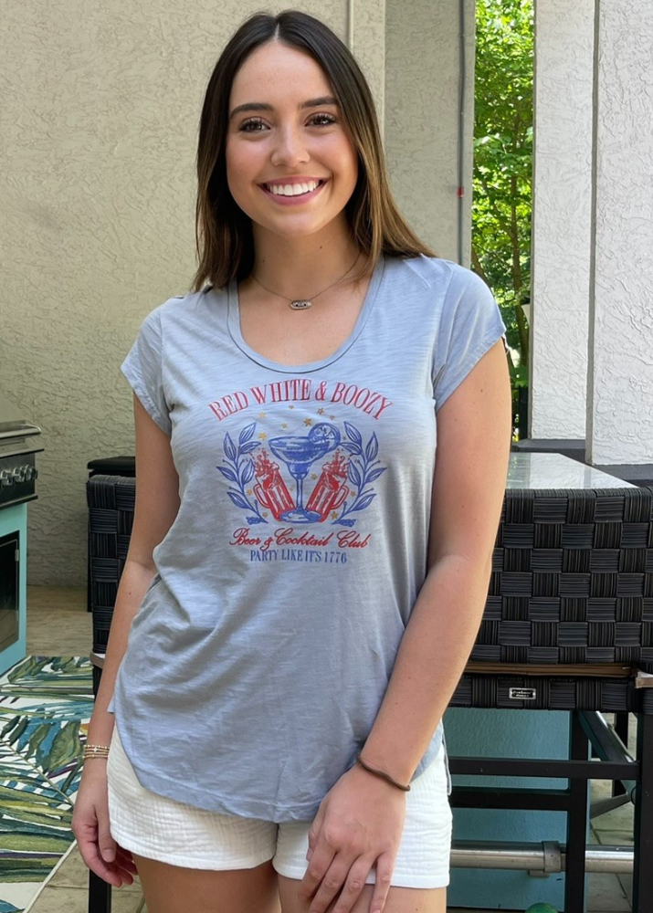 Made in USA Women's Patriotic Scoop Neck Graphic Garment Dyed Cotton Tee T-Shirt with Shirring at Shoulder, "Red, White and Boozy" Graphic on Light Gray Top | Classy Cozy Cool Made in America Boutique