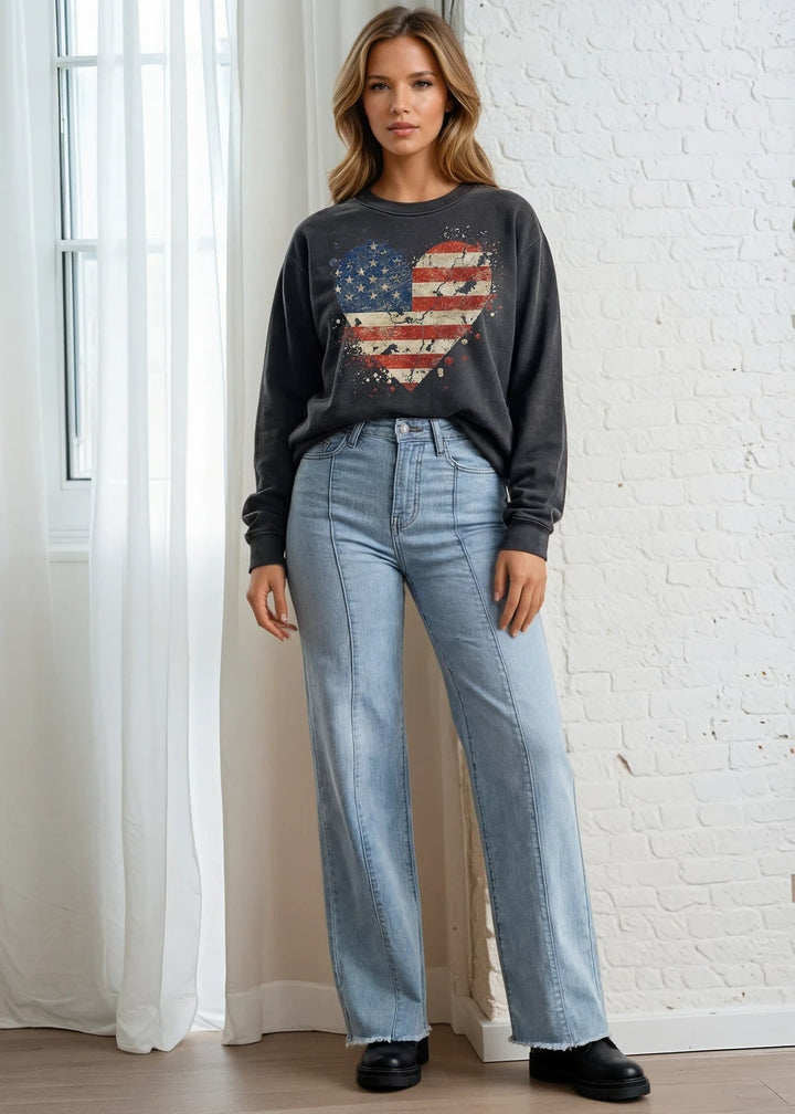 Celebrate American pride with this heavyweight sweatshirt, featuring a distressed flag heart graphic on pigment-dyed cotton fleece. The relaxed crew neck silhouette and long sleeves deliver comfort through fall and winter months. Crafted from 100% preshrunk cotton and made in the USA, this piece resists fading and maintains its shape wash after wash. 
