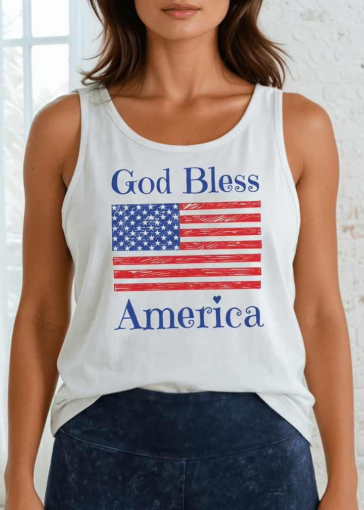 God Bless America Flag Graphic Tank Top | Made in USA Cotton, Say it in something made here! USA-made God Bless America flag graphic tank in white garment wash. Soft 95% cotton, relaxed fit, grown &amp; sewn in America.