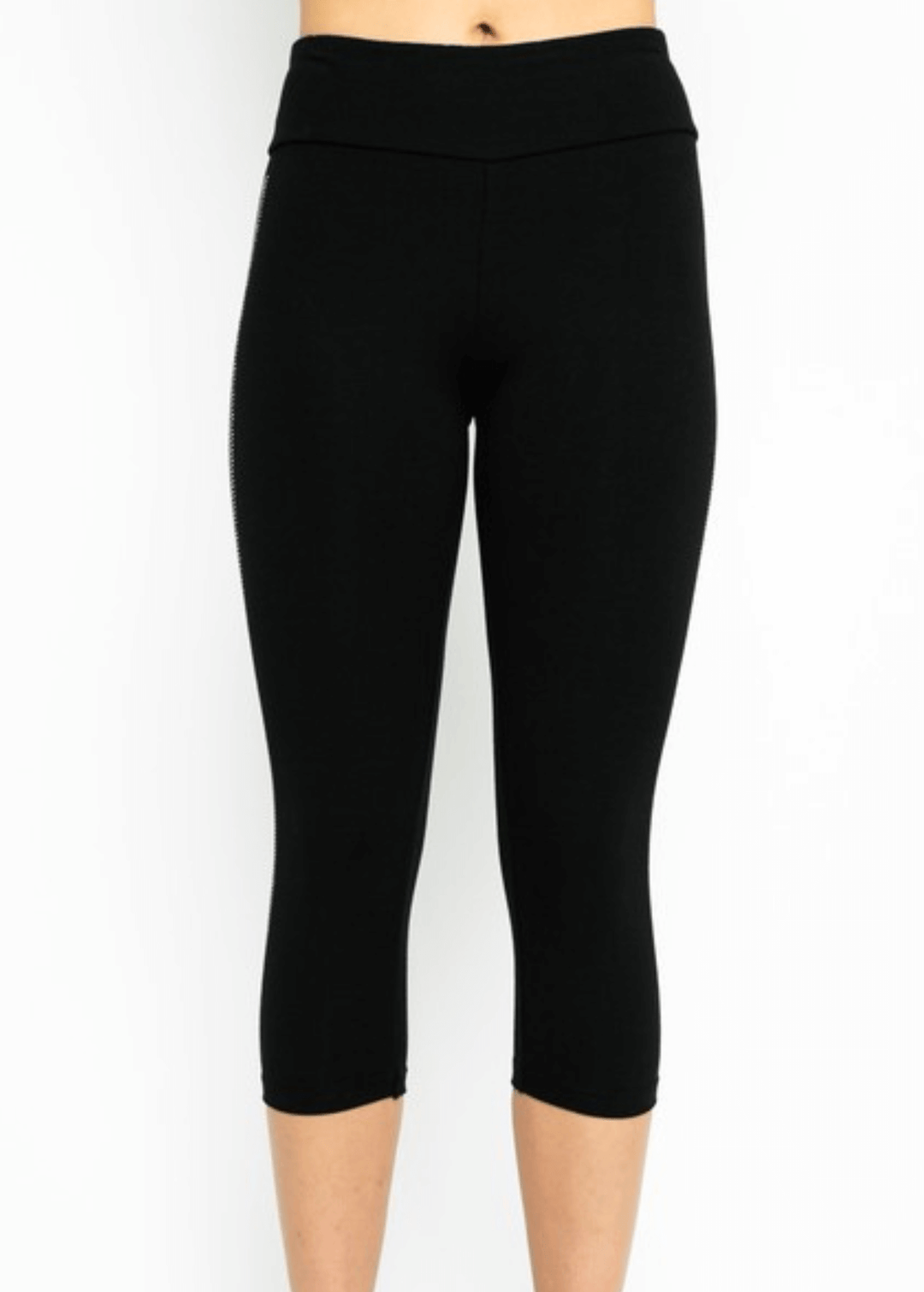 Meet the Carmen Capri Leggings in Black—American-made quality you can feel the difference in. These sleek black capris feature a striking side stripe embellished with shimmering stones, adding just the right touch of glamour to your everyday look.