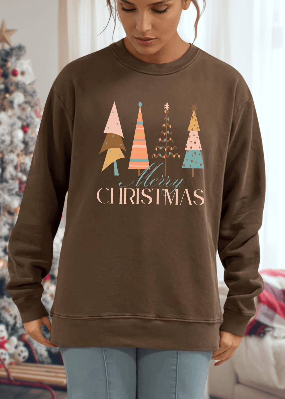 Celebrate the season in comfort with this heavyweight pigment-dyed cotton sweatshirt, featuring a charming pastel Christmas tree graphic. Crafted with excellent USA quality that lasts, this piece offers a relaxed, loose-fitting silhouette perfect for cozy gatherings and casual days. The crew neck and long sleeves provide warmth, while the durable construction ensures it becomes a holiday favorite year after year. Choose from Washed Black, Evergreen, or Mocha