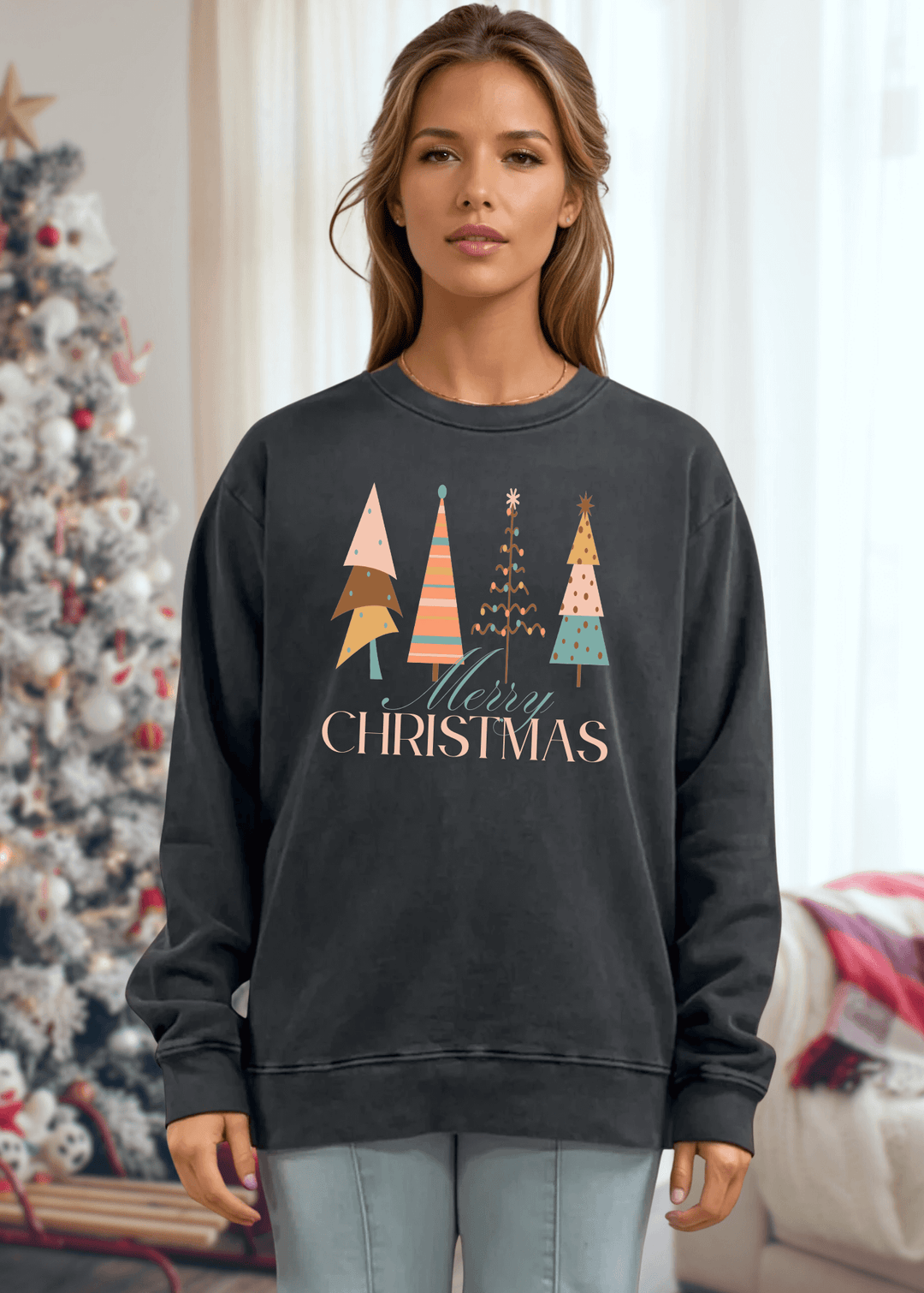 Celebrate the season in comfort with this heavyweight pigment-dyed cotton sweatshirt, featuring a charming pastel Christmas tree graphic. Crafted with excellent USA quality that lasts, this piece offers a relaxed, loose-fitting silhouette perfect for cozy gatherings and casual days. The crew neck and long sleeves provide warmth, while the durable construction ensures it becomes a holiday favorite year after year. Choose from Washed Black, Evergreen, or Mocha