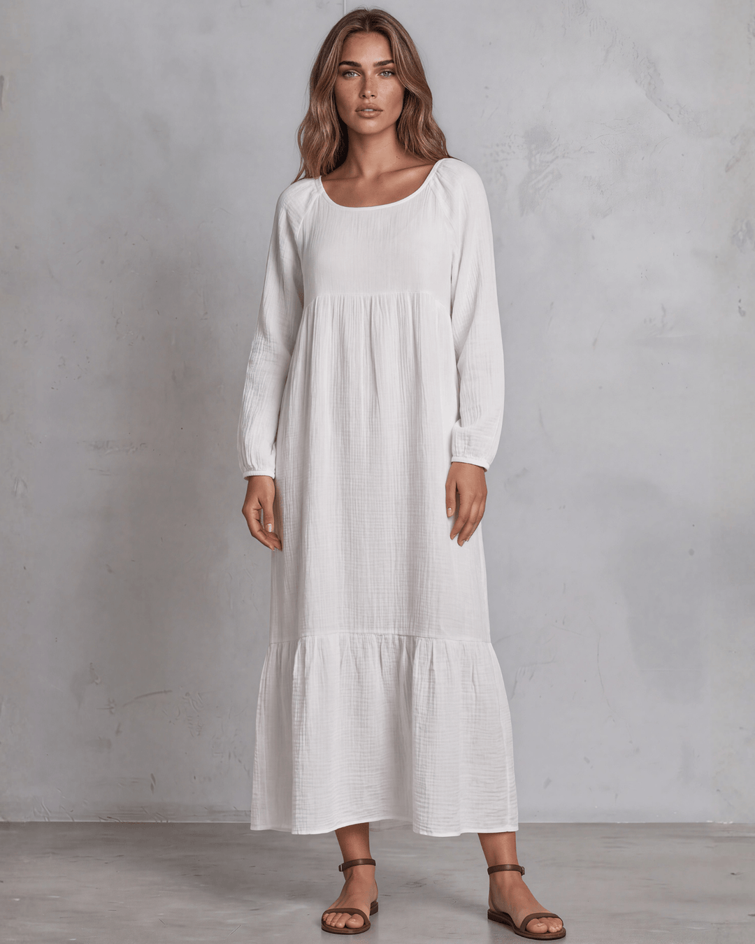  White Cotton Gauze Maxi Dress. Scoop neck, billowy sleeves, tiered ruffle hem, 100% cotton. S–XL. Made in USA.