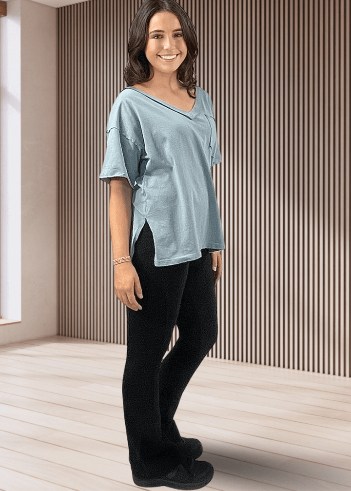 This Made in USA Slate Blue T-Shirt offers a relaxed fit made from soft, 100% cotton medium-weight fabric that is garment washed for lasting comfort. Featuring a raw edge detail and a convenient front pocket, this short-sleeve tee is perfect for everyday wear.