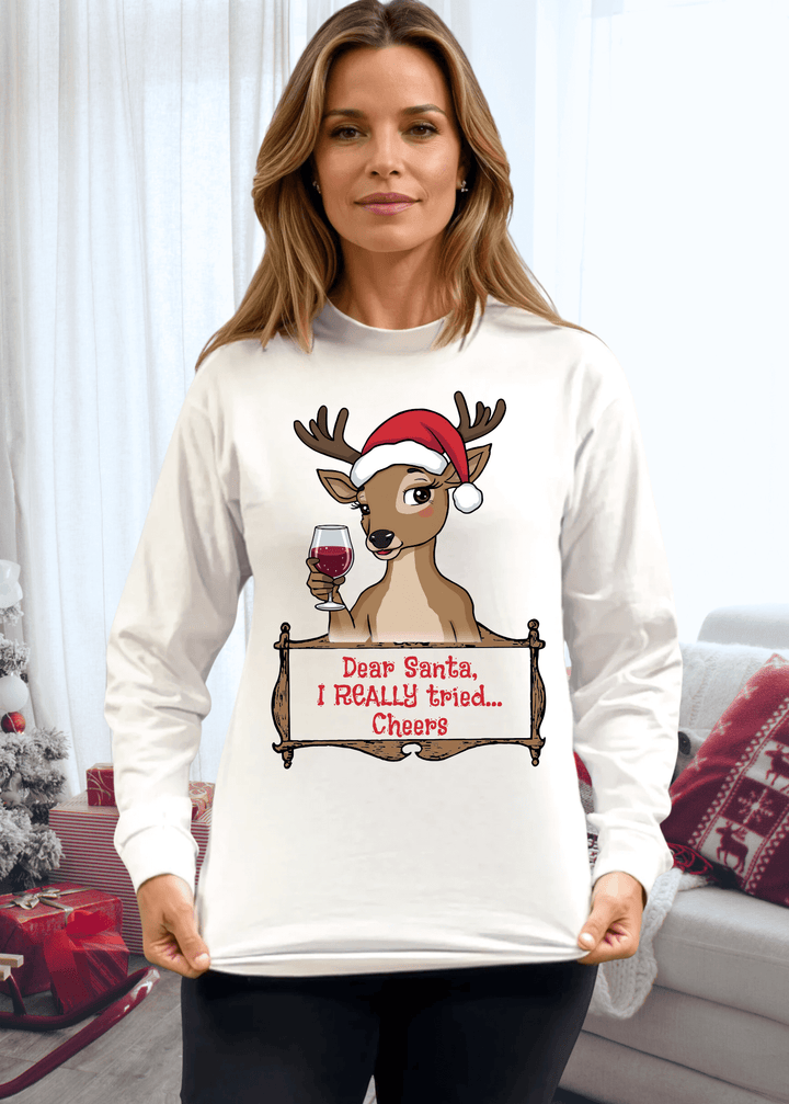 Embrace the holiday spirit with a wink and a smile in this playful "Santa, I Really Tried" reindeer graphic tee. Featuring an adorable reindeer clutching a wine glass
