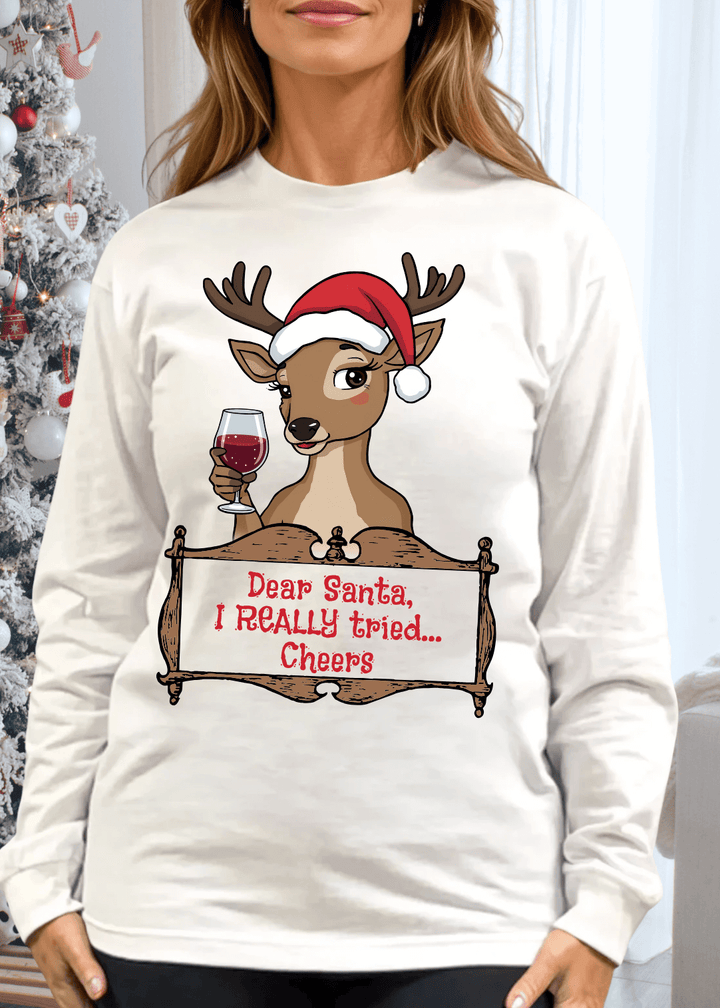 Embrace the holiday spirit with a wink and a smile in this playful "Santa, I Really Tried" reindeer graphic tee. Featuring an adorable reindeer clutching a wine glass
