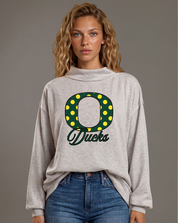 Oregon Ducks gameday polka dot graphic mock neck sweatshirt in heather grey. Oversized, super soft, made in USA. Perfect gameday top. Sizes S–L.