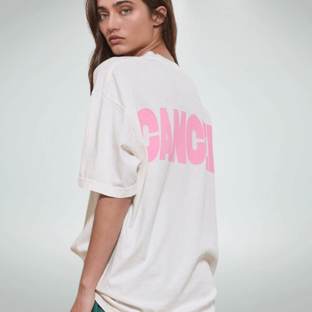 Made in USA Women's Oversized "FCK CANCER" Graphic Tee, Crew Neck, Short Sleeves, White with Pink Lettering, Longer Length, 100% Cotton | Bucket List Fashion Style T2284F