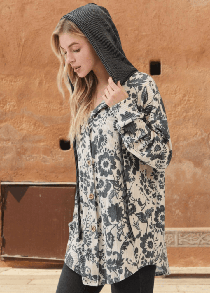 Elevate your layering game with the Elise Floral Ribbed Knit Shacket—a versatile piece that seamlessly transitions from season to season. Crafted from a soft ribbed knit in a striking allover floral pattern, this shacket combines comfort with contemporary style. 