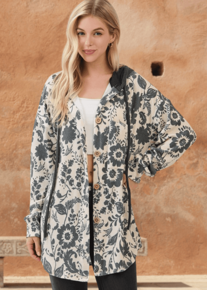 Elevate your layering game with the Elise Floral Ribbed Knit Shacket—a versatile piece that seamlessly transitions from season to season. Crafted from a soft ribbed knit in a striking allover floral pattern, this shacket combines comfort with contemporary style. 