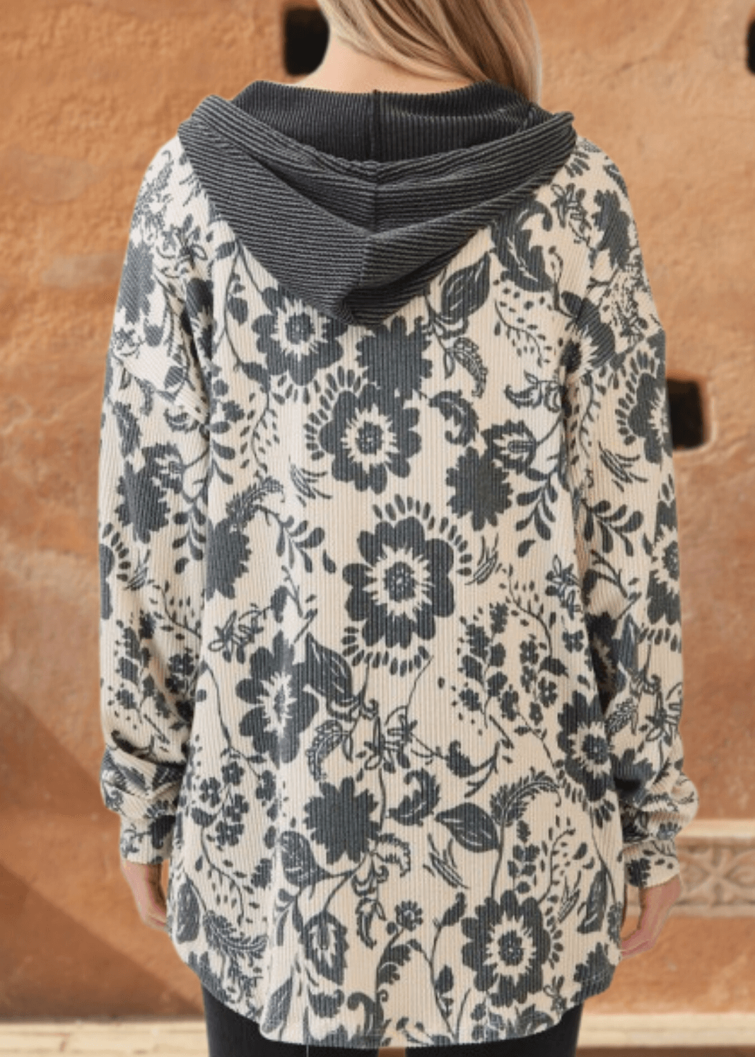 Elevate your layering game with the Elise Floral Ribbed Knit Shacket—a versatile piece that seamlessly transitions from season to season. Crafted from a soft ribbed knit in a striking allover floral pattern, this shacket combines comfort with contemporary style. 