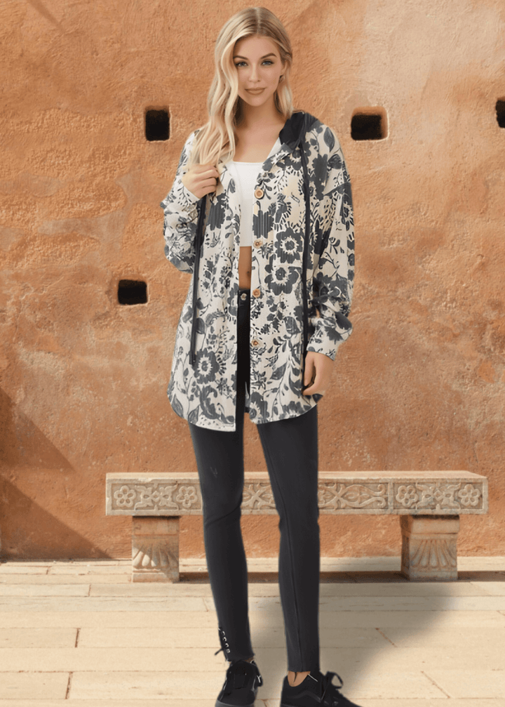 Elevate your layering game with the Elise Floral Ribbed Knit Shacket—a versatile piece that seamlessly transitions from season to season. Crafted from a soft ribbed knit in a striking allover floral pattern, this shacket combines comfort with contemporary style. 