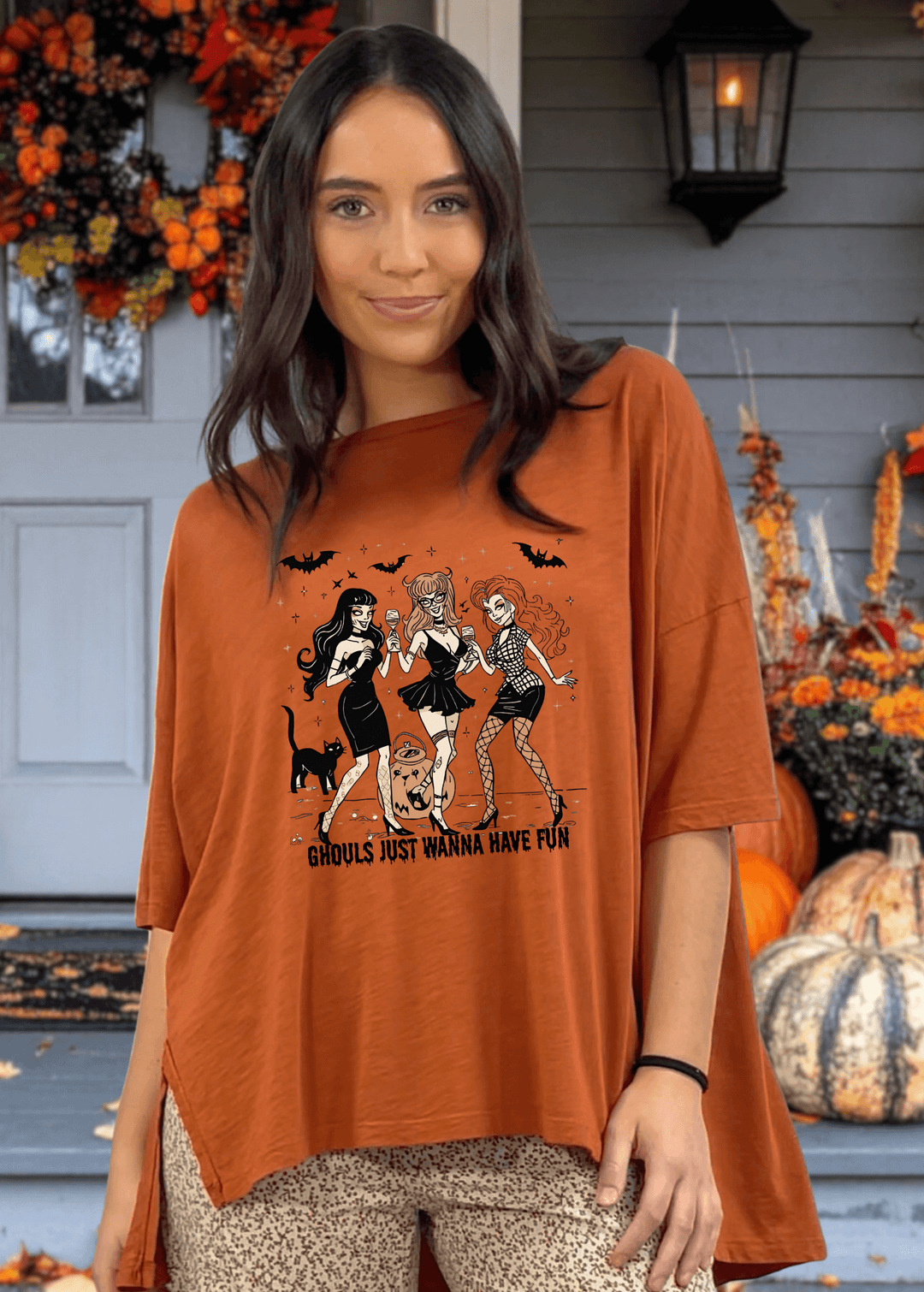 Embrace spooky season in comfort with this Slouchy Oversized Cotton Tee in Gingerbread. Crafted in USA, Playful "Ghouls Just Wanna Have Fun" graphic adds festive charm