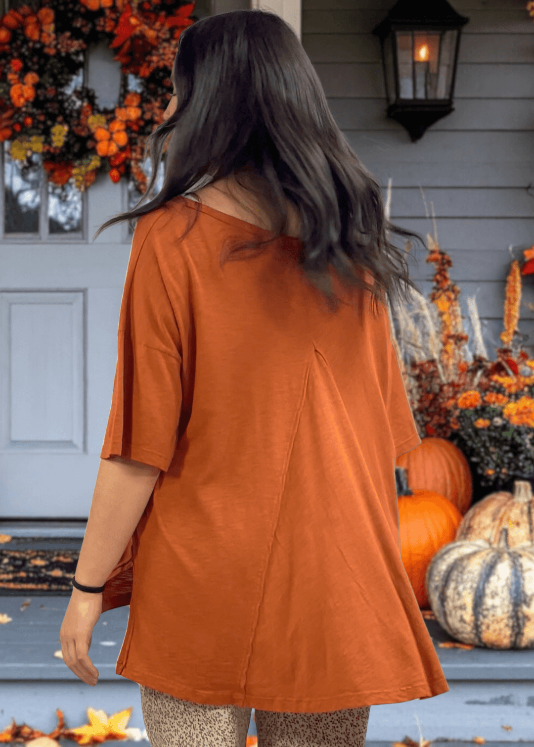 Embrace spooky season in comfort with this Slouchy Oversized Cotton Tee in Gingerbread. Crafted in USA, Playful "Ghouls Just Wanna Have Fun" graphic adds festive charm
