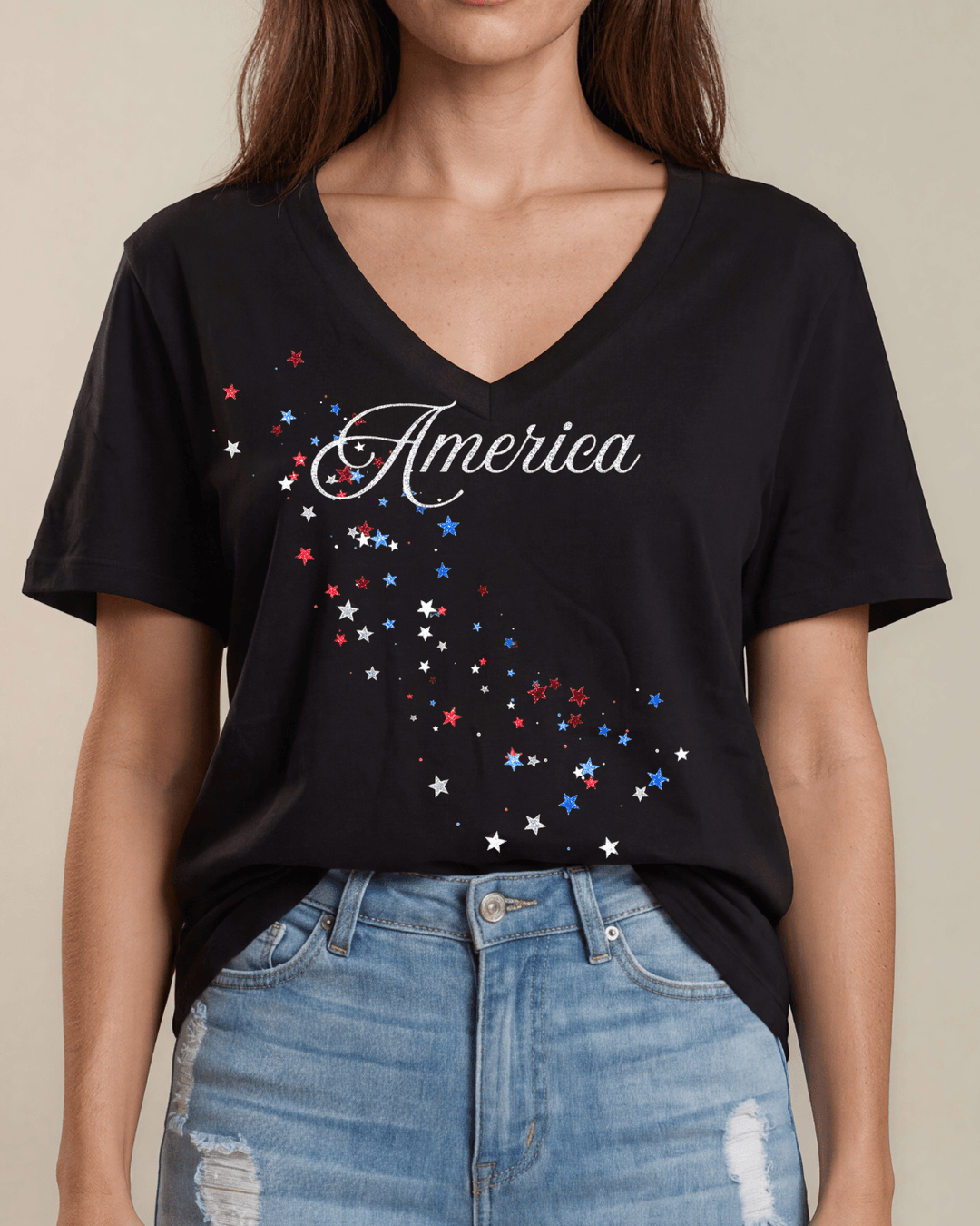 Glitter America script with cascading red, white &amp; blue stars on a black V-neck tee. 100% cotton, USA-milled fabric, made in USA. Perfect for 4th of July.