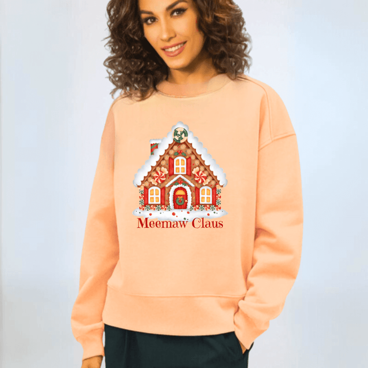 Made in USA Women's Apricot Crew Neck Fleece Sweatshirt with Grandma Clause Christmas House Graphic, Heavyweight Cotton Fleece, Relaxed Fit, Personalized | Classy Cozy Cool Made in USA Boutique