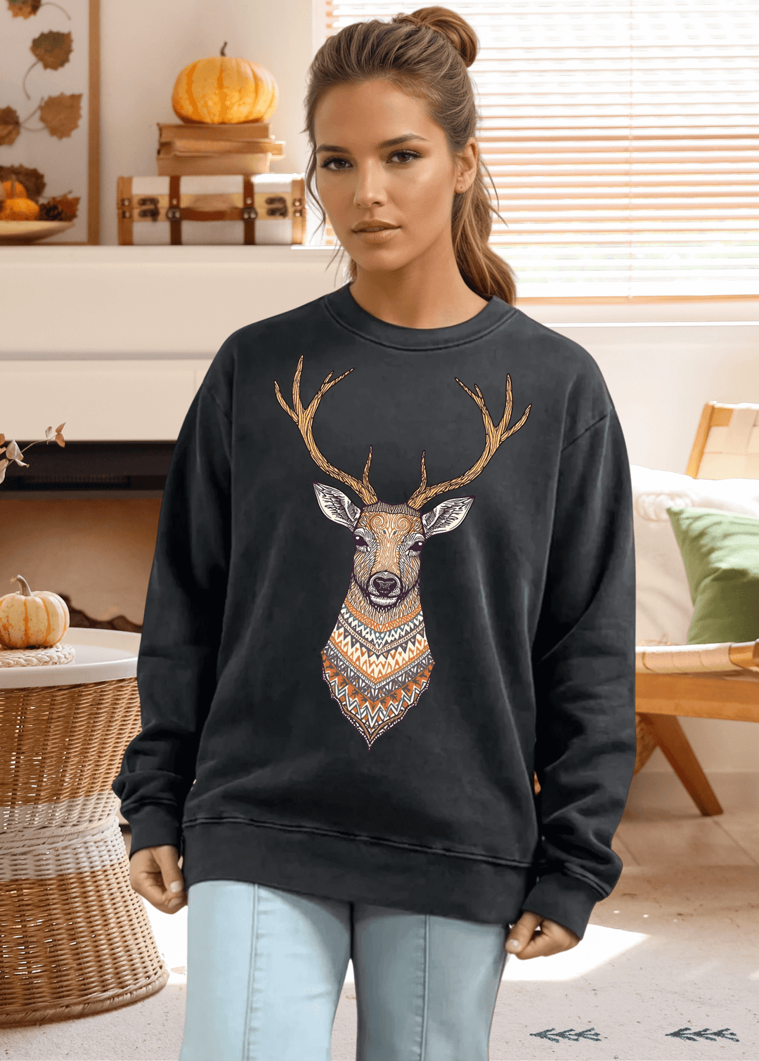 This Artsy Reindeer Graphic Sweatshirt in washed black offers cozy warmth and stylish comfort for fall and winter. Made in USA from 100% heavyweight preshrunk cotton