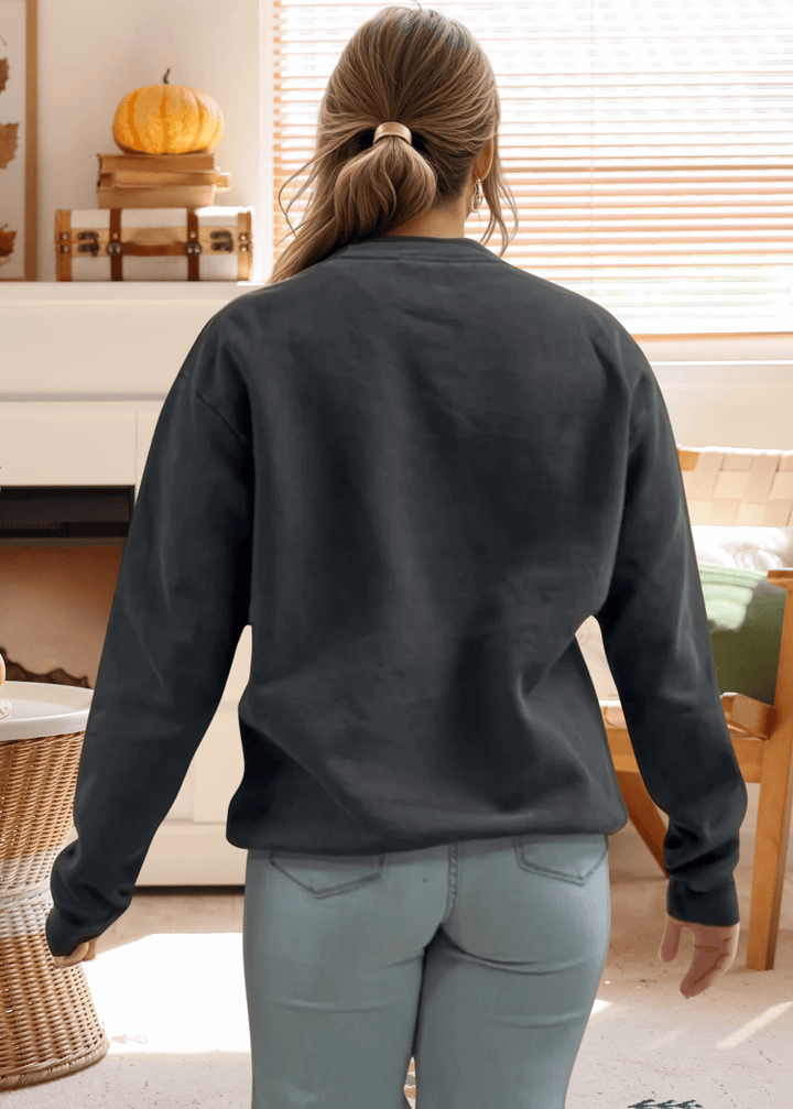 This Artsy Reindeer Graphic Sweatshirt in washed black offers cozy warmth and stylish comfort for fall and winter. Made in USA from 100% heavyweight preshrunk cotton