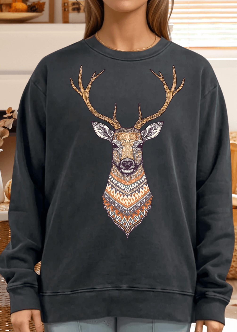 This Artsy Reindeer Graphic Sweatshirt in washed black offers cozy warmth and stylish comfort for fall and winter. Made in USA from 100% heavyweight preshrunk cotton