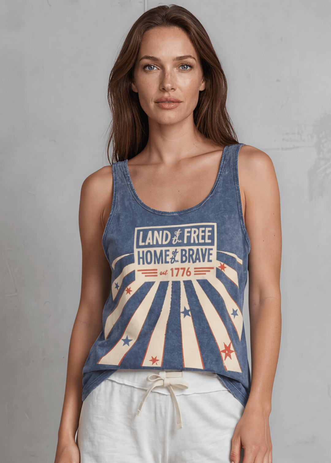 Land of the Free Home of the Brave Est. 1776 Graphic Tank — Made in USA with USA Grown Cotton. Mineral washed denim blue, soft 95% cotton. Perfect for 4th of July.