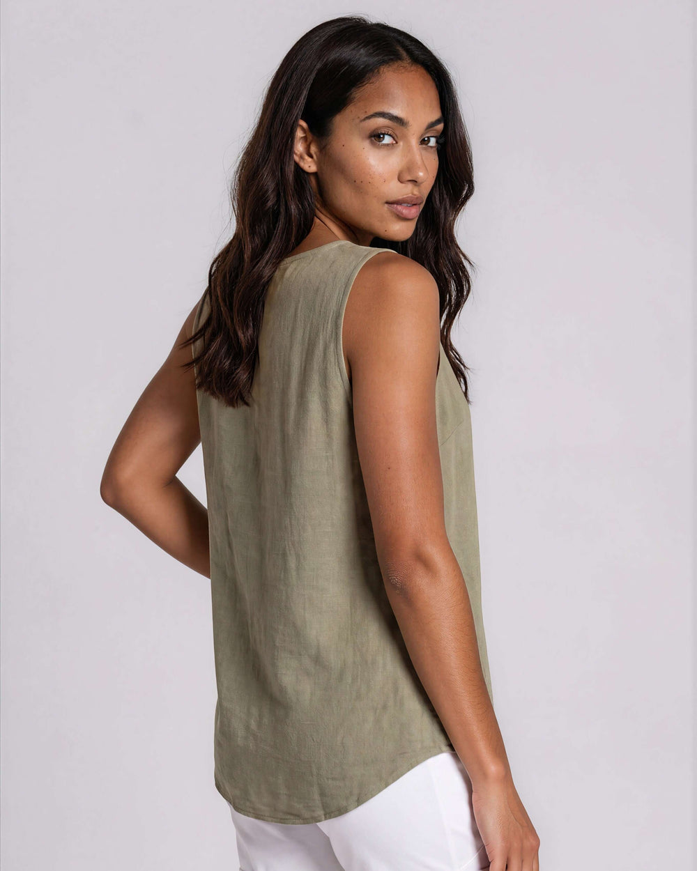 Sage olive sleeveless tank top with a round neckline, relaxed easy fit, and lightweight draping rayon-linen fabric. Made in USA