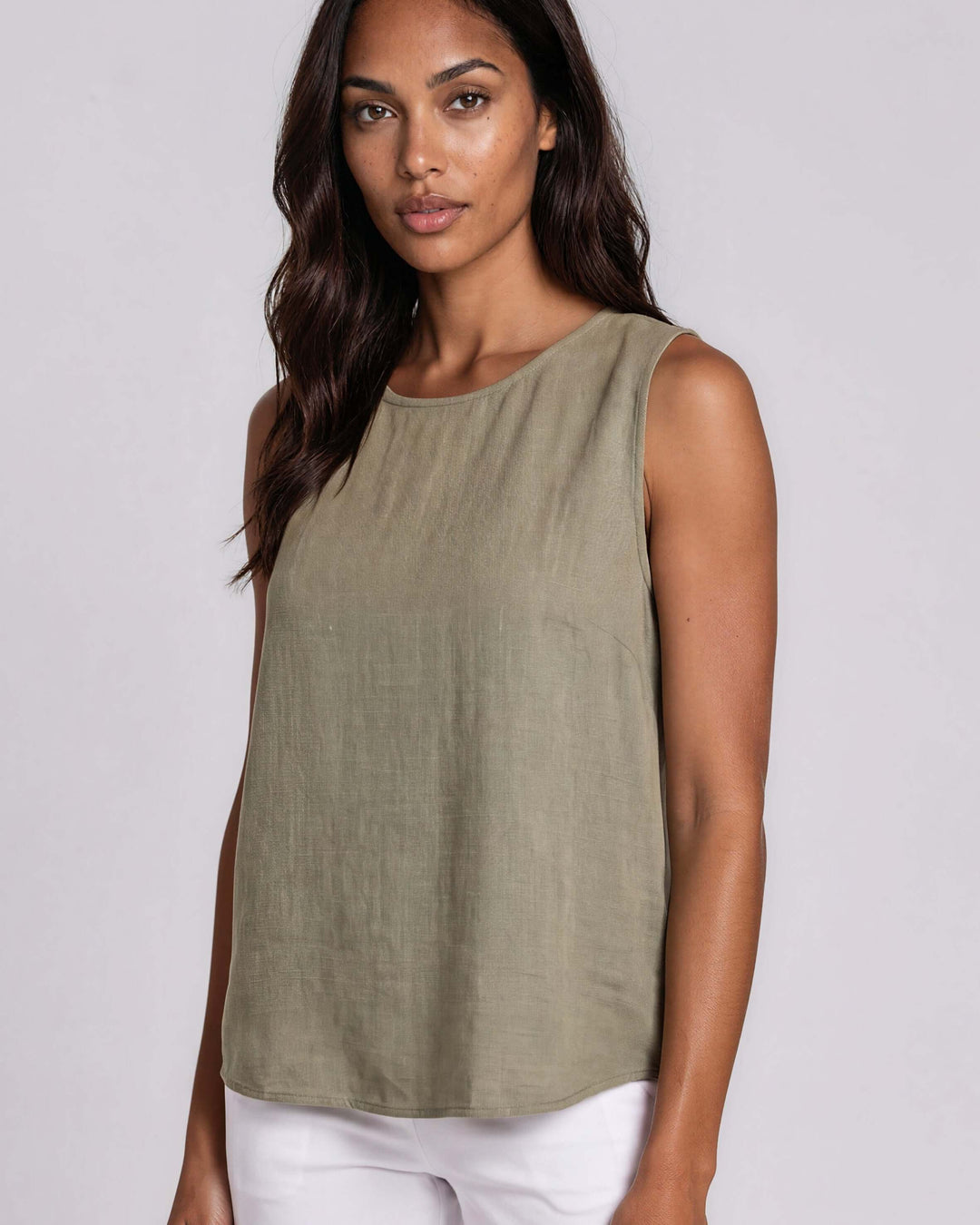 Sage olive sleeveless tank top with a round neckline, relaxed easy fit, and lightweight draping rayon-linen fabric. Made in USA