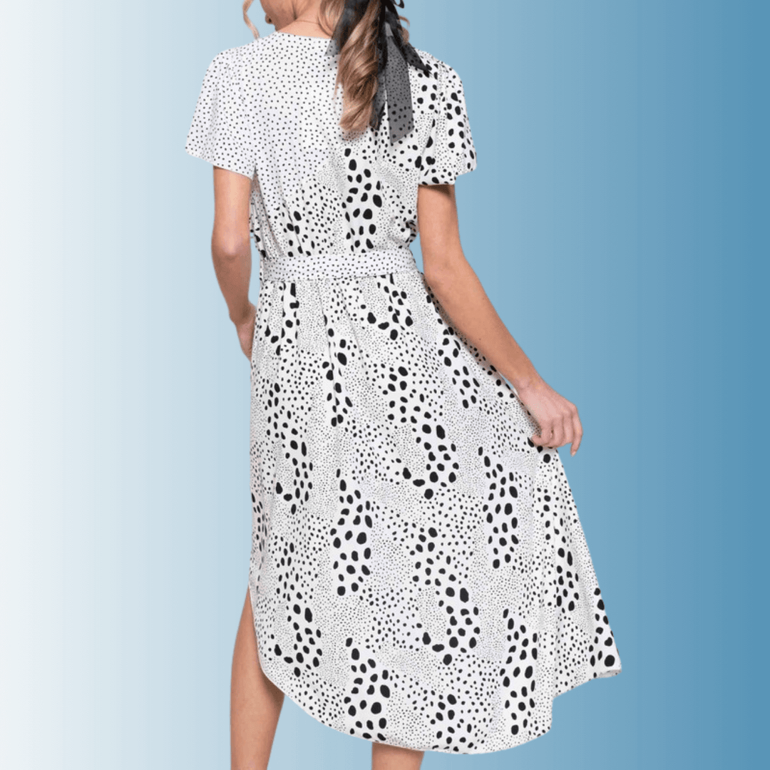 Women's Feminine V-Neck Black and White Polka Dot Midi Dress, Flutter Short Sleeves, Ruffle Front Detail, Belt Waistline, Asymmetrical Hem | Made in USA