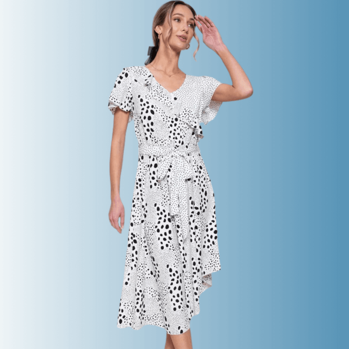 Women's Feminine V-Neck Black and White Polka Dot Midi Dress, Flutter Short Sleeves, Ruffle Front Detail, Belt Waistline, Asymmetrical Hem | Made in USA