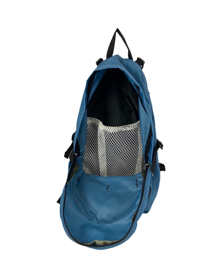 Made in USA, open denim blue diaper bag backpack showing interior mesh pocket