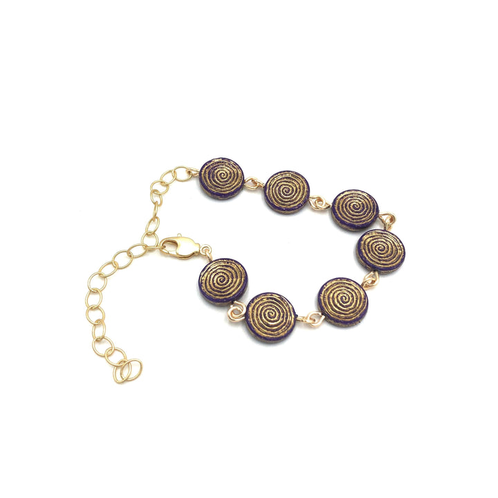 Dainty stackable bracelet with golden-washed purple Lucite beads, hand-linked. Vintage &
