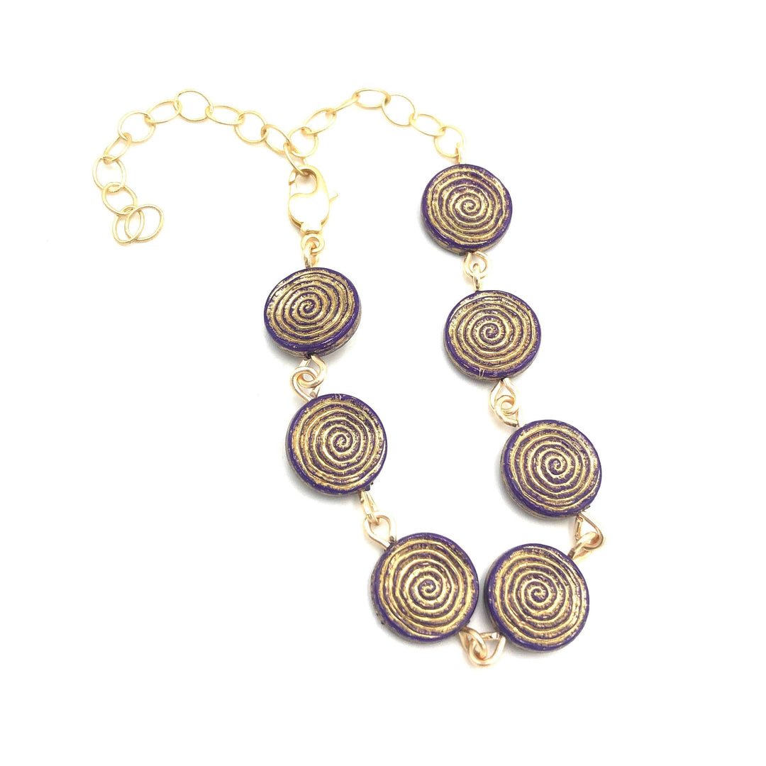 Dainty stackable bracelet with golden-washed purple Lucite beads, hand-linked. Vintage '60s-'80s components, adjustable 6.5"-10". Made in USA.