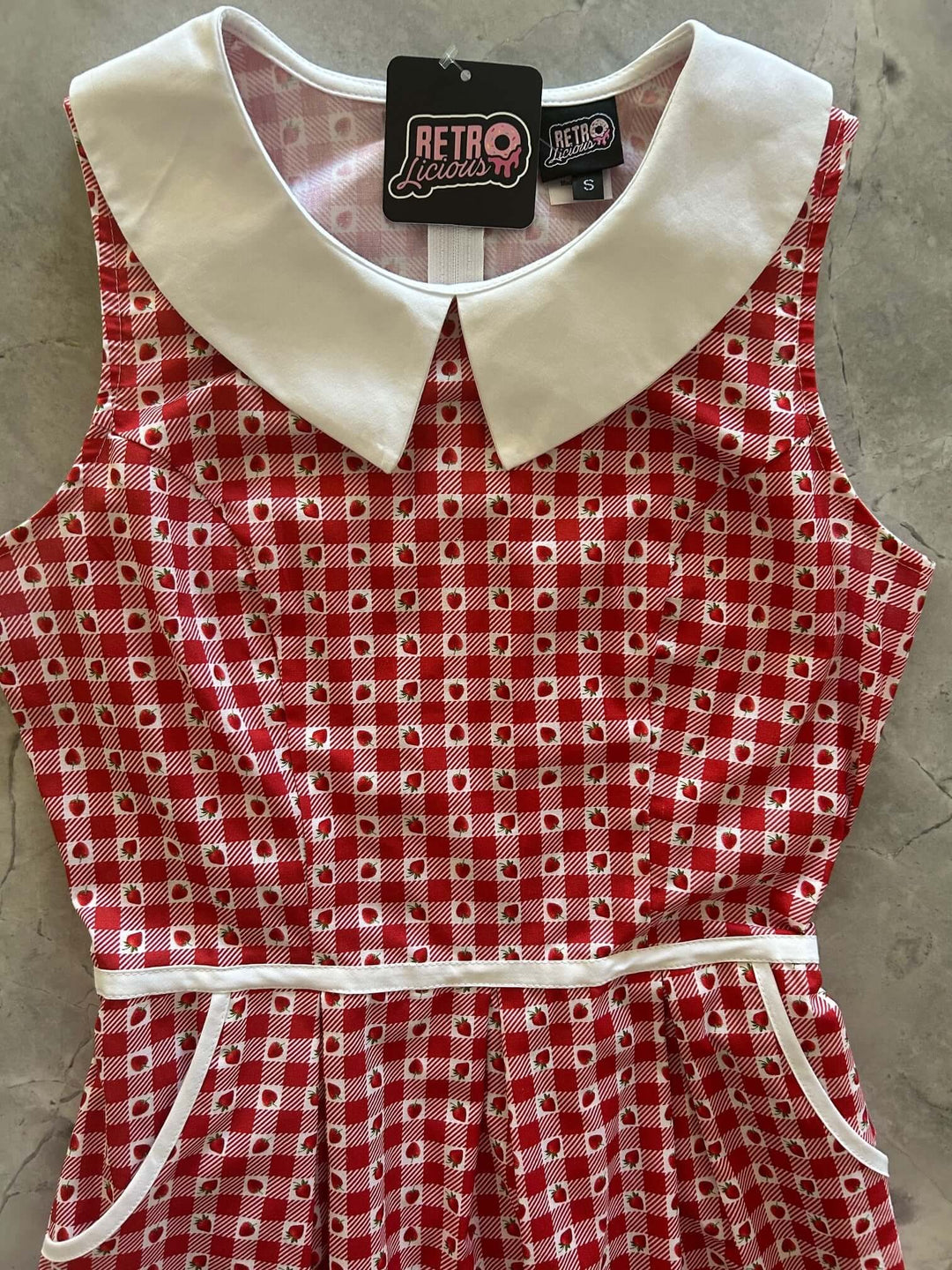 Made in USA, A women's vintage style piece with fun, modern details; our midi dress is now available in our Strawberry print. Made from 100% cotton
