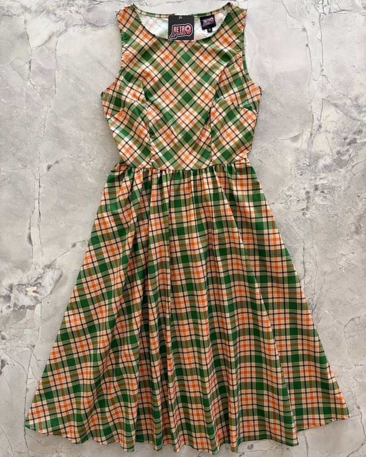 Made in USA. Shop the Rust &amp; Green Plaid cotton midi dress by Retrolicious, with a high neckline, full swing skirt and hidden pockets. Sizes XS–4X.