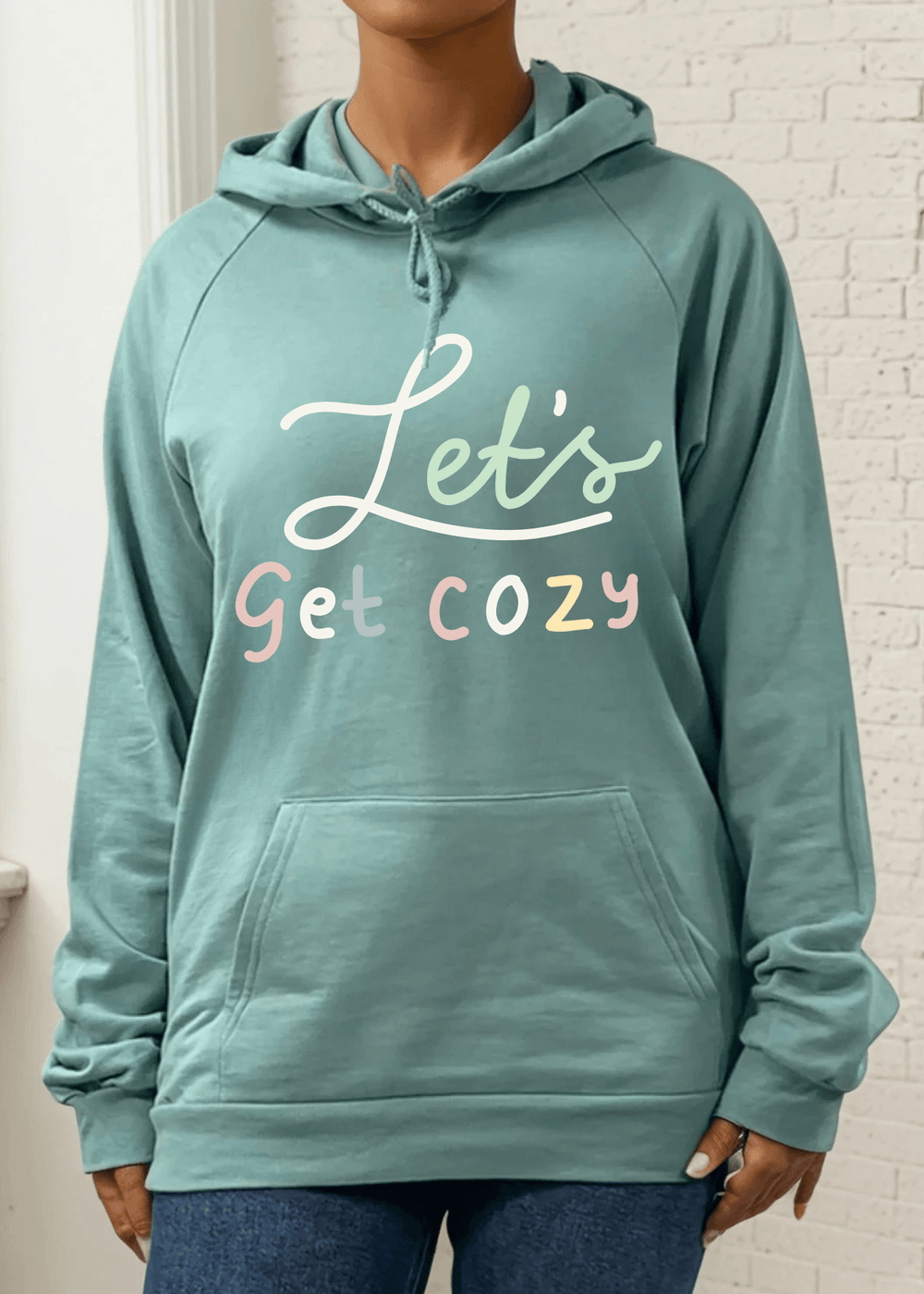 Experience unmatched comfort with this USA Made "Let's Get Cozy" Graphic Organic Cotton Pullover Hoodie in Arctic Blue. Crafted in the USA from 100% combed ring-spun organic cotton fleece