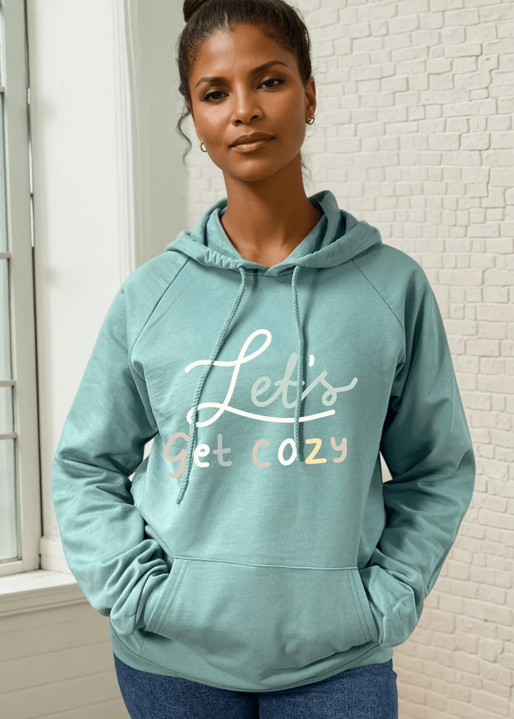 Experience unmatched comfort with this USA Made "Let's Get Cozy" Graphic Organic Cotton Pullover Hoodie in Arctic Blue. Crafted in the USA from 100% combed ring-spun organic cotton fleece