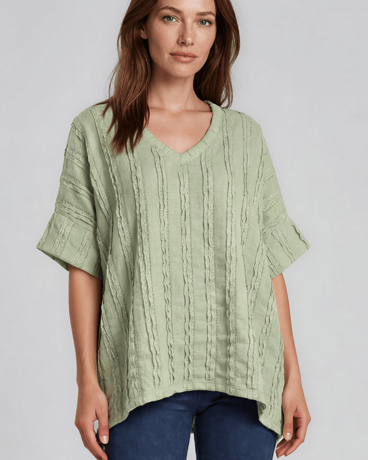 Shop the Laurel Textured Top in Light Sage — a relaxed oversized v-neck with striped lace effect, contrast sleeve bands &amp; side slit. Made in USA.