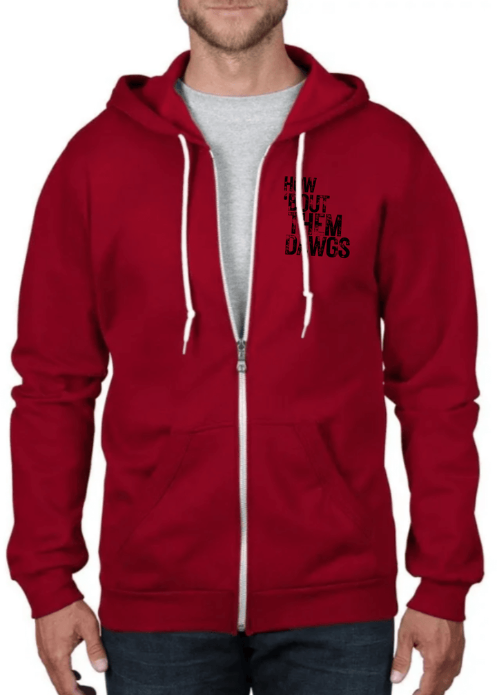 Show your Bulldog pride with this iconic Georgia Dawgs hoodie, featuring bold distressed graphics that capture the spirit of Sanford Stadium. The front chest displays "How 'Bout Them Dawgs" while the back proclaims "Them Dawgs is Hell"—authentic statements every true fan knows by heart. Constructed in the USA from premium 100% combed ring spun organic cotton fleece