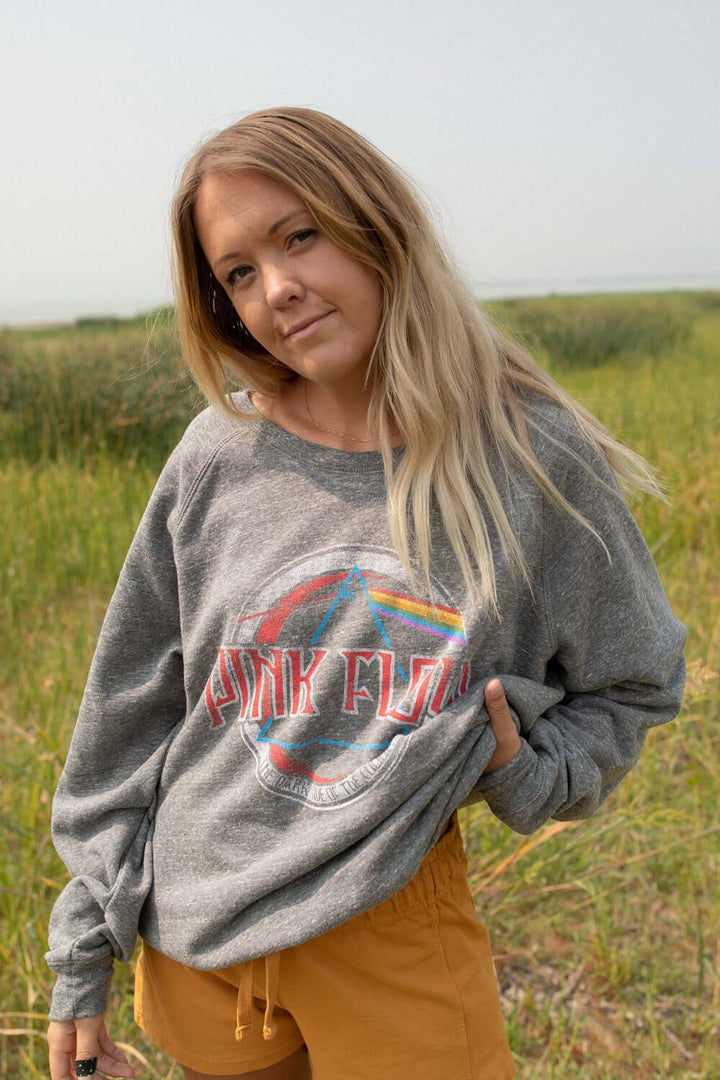 Loving our new organically made Pink Floyd sweatshirt!+ Heather Gray Colored Sweatshirt+ Crew neck+ Heathered gray colored fleece+ Raglan, Cuffed sleeves+ Featuring a Pink Floyd logo
