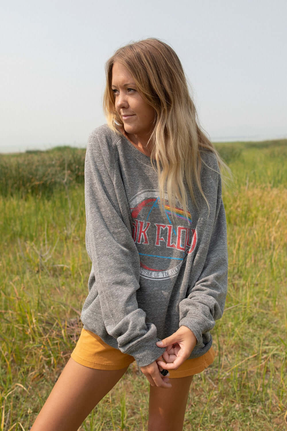Loving our new organically made Pink Floyd sweatshirt!+ Heather Gray Colored Sweatshirt+ Crew neck+ Heathered gray colored fleece+ Raglan, Cuffed sleeves+ Featuring a Pink Floyd logo