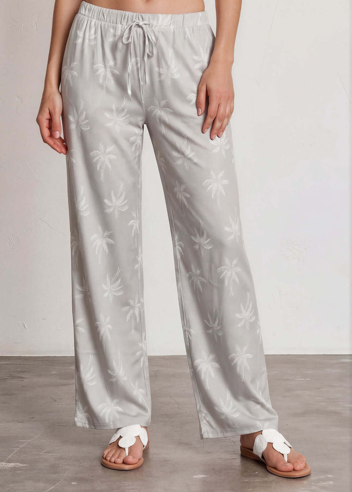  Presley Palm Tree Wide Leg Pants — a relaxed wide-leg style with a tonal palm print, elastic waist &amp; drawstring. Made in USA. Perfect for resort &amp; vacation.