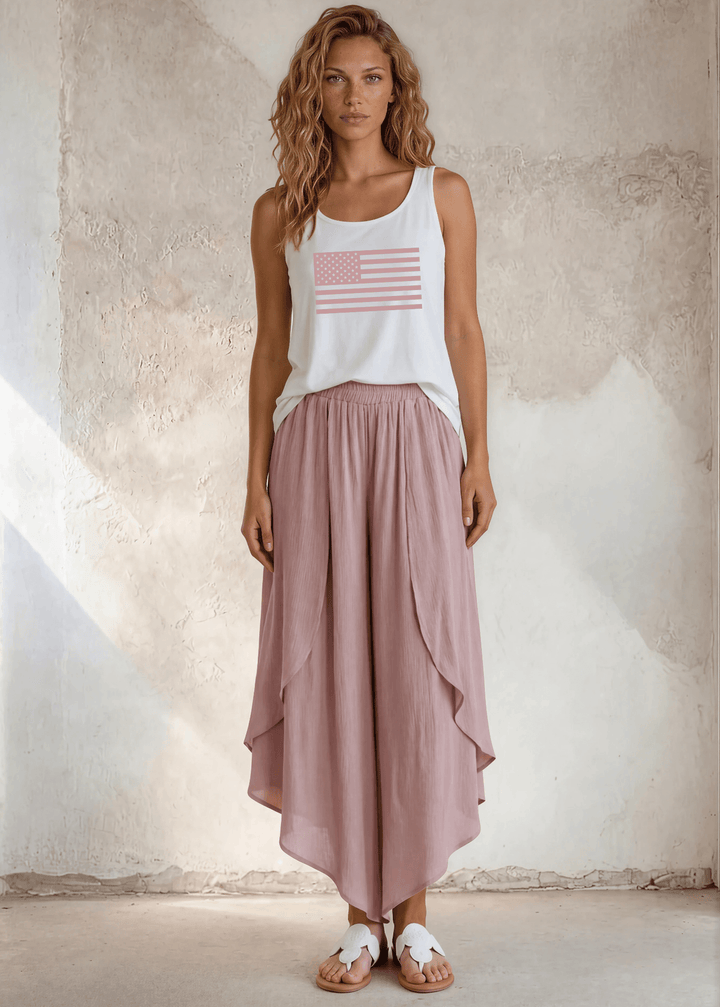 Say it in something made here! USA-made Patriotic Pink USA Flag Graphic tank in white garment wash. Soft 95% cotton, relaxed fit, grown &amp; sewn in America.